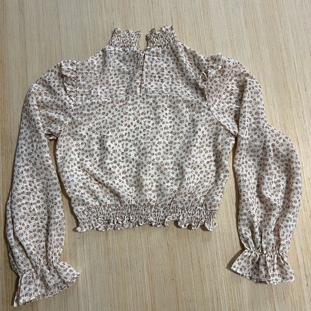 Papaya cream colored turtle neck long sleeve blouse